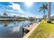 Scenic view of the waterfront featuring a private boat dock, ideal for boating and enjoying the waterfront lifestyle at 2181 Via Seville, Punta Gorda, FL 33950