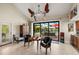 Cozy sitting area with sliding glass doors that provide natural light and tranquil outdoor views at 2407 St Davids Island Ct, Punta Gorda, FL 33950