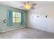 Inviting bedroom with natural light, light blue walls, and charming sea-life decorations at 25050 Sandhill Blvd # B2 Building 6, Punta Gorda, FL 33983
