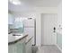 Bright kitchen with white cabinets, marble countertops, and modern appliances at 25050 Sandhill Blvd # B2 Building 6, Punta Gorda, FL 33983
