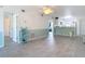 Comfortable living space with tile floors that leads to the kitchen, perfect for entertaining at 25050 Sandhill Blvd # B2 Building 6, Punta Gorda, FL 33983
