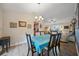 Dining room with table set and a view of the living area at 25069 Bolivar Dr, Punta Gorda, FL 33983
