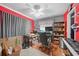 A functional office with wood floors, a ceiling fan, and a cozy rug, perfect for a productive workspace at 25069 Bolivar Dr, Punta Gorda, FL 33983