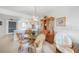 Cozy dining area with charming furniture, ample natural light, and an open layout connecting to the kitchen at 25275 Rampart Blvd # 1602, Punta Gorda, FL 33983
