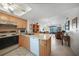 Open kitchen with sleek appliances, connecting seamlessly to the dining and living area for easy entertaining at 25275 Rampart Blvd # 1602, Punta Gorda, FL 33983