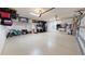 This two car garage offers epoxy floors, plenty of room for storage and work space at 26034 Feathersound Dr, Punta Gorda, FL 33955