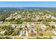 Aerial view of a residential neighborhood featuring many houses and streets at 383 Northview St, Port Charlotte, FL 33954