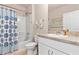 Cozy bathroom with a tub/shower, a white vanity and neutral wall paint at 3860 Cobblestone Ln, Punta Gorda, FL 33980