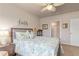 Comfortable bedroom features a bed, window, and storage, creating a tranquil and inviting space at 3860 Cobblestone Ln, Punta Gorda, FL 33980