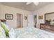 Bedroom view showcasing a bed, dresser, and multiple doorways, adding functionality and flow to the layout at 3860 Cobblestone Ln, Punta Gorda, FL 33980