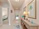Inviting foyer with tile flooring, neutral paint and arched doorways leading to other living spaces at 3860 Cobblestone Ln, Punta Gorda, FL 33980