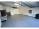 Clean, organized garage with epoxy floor and storage at 507 Saint Girons Ct, Punta Gorda, FL 33950