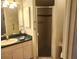 Well-maintained bathroom featuring a glass enclosed shower and vanity at 5098 Adina Cir, North Port, FL 34291