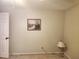 Neutral bedroom features a picture and a lamp, ready for personalization at 5098 Adina Cir, North Port, FL 34291