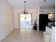 Bright dining area with sliding glass doors leading to outdoor space at 5098 Adina Cir, North Port, FL 34291