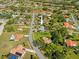 Community aerial view of a home with a pool, nestled within a scenic neighborhood at 5126 Richmond Ter, North Port, FL 34287