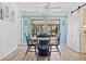 The dining room features a charming decor with a view of the lanai, allowing you to embrace the outdoors at 5126 Richmond Ter, North Port, FL 34287