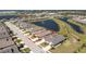 Aerial view of the property in a community with ponds, landscaping, and well-maintained lawns at 7304 W Lenox Circle, Punta Gorda, FL 33950