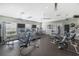 Spacious gym with state-of-the-art equipment and multiple ceiling fans for comfortable workouts at 7304 W Lenox Circle, Punta Gorda, FL 33950