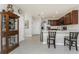 Well-lit kitchen with stainless steel appliances, breakfast bar, and neutral countertops at 7304 W Lenox Circle, Punta Gorda, FL 33950