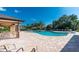 Large community pool with lounge chairs and a spacious deck is perfect for summer relaxation at 7304 W Lenox Circle, Punta Gorda, FL 33950