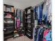 Well-organized walk-in closet featuring ample shelving and hanging space at 7304 W Lenox Circle, Punta Gorda, FL 33950