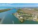 Aerial view of waterfront neighborhood with stunning views of the ocean at 75 Spyglass Aly, Placida, FL 33946