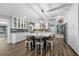 Spacious kitchen with a center island, pendant lighting, and stainless appliances at 75 Spyglass Aly, Placida, FL 33946