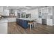 Gourmet kitchen with stainless steel appliances and a large center island at 75 Spyglass Aly, Placida, FL 33946