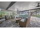 Inviting outdoor patio with comfortable seating, a large rug, and expansive views at 75 Spyglass Aly, Placida, FL 33946