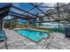 Refreshing pool with a screened enclosure, and a tranquil water view at 75 Spyglass Aly, Placida, FL 33946