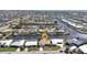 An aerial view of a waterfront community with canals and single-Gathering homes at 944 Genoa Ct, Punta Gorda, FL 33950