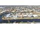 Beautiful aerial view of waterfront homes in a canal community with private docks and lush landscaping at 944 Genoa Ct, Punta Gorda, FL 33950