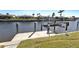 Close-up shot of a private concrete dock with a boat lift, ideal for waterfront living and boating activities at 944 Genoa Ct, Punta Gorda, FL 33950