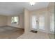 Foyer area with tile flooring, and double doors leading to the exterior at 944 Genoa Ct, Punta Gorda, FL 33950