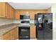 Kitchen featuring granite countertops and stainless steel appliances at 944 Genoa Ct, Punta Gorda, FL 33950