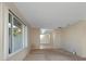 Bright living room features large windows with natural light and neutral carpeting at 944 Genoa Ct, Punta Gorda, FL 33950