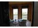 Cozy balcony setup with comfortable seating, offering nice community views at 99 Vivante Blvd # 404, Punta Gorda, FL 33950