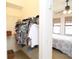 Bedroom closet with shelves, rods, and natural light seeping in from the bedroom at 99 Vivante Blvd # 404, Punta Gorda, FL 33950