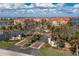 Scenic view of the community entrance and waterway featuring beautiful buildings at 99 Vivante Blvd # 404, Punta Gorda, FL 33950