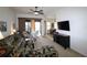 Open living space leading to an outdoor balcony and a formal dining area at 99 Vivante Blvd # 404, Punta Gorda, FL 33950