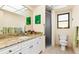 Bathroom featuring a granite vanity, framed mirror, walk-in shower, and modern fixtures at 11 Mark Twain Ln, Rotonda West, FL 33947