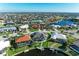 This aerial view highlights the home's waterfront access and surrounding community at 1368 Grebe Dr, Punta Gorda, FL 33950