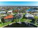 Expansive aerial view showcases a waterfront community with numerous homes and canals at 1368 Grebe Dr, Punta Gorda, FL 33950