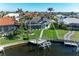 An aerial view of the backyard and dock, showing great outdoor living spaces at 1368 Grebe Dr, Punta Gorda, FL 33950