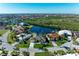 Scenic aerial view of a waterfront community with beautiful homes and lush greenery at 1368 Grebe Dr, Punta Gorda, FL 33950