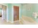 Bathtub and tile shower, creating a serene spa-like atmosphere at 1368 Grebe Dr, Punta Gorda, FL 33950