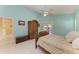 Bedroom with decorative wood furniture and access door to the outside area at 1368 Grebe Dr, Punta Gorda, FL 33950