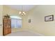 Bright dining area with modern light fixture and neutral decor at 1368 Grebe Dr, Punta Gorda, FL 33950