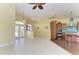 Open-concept layout featuring tile flooring and seamlessly connecting the living and kitchen areas at 1368 Grebe Dr, Punta Gorda, FL 33950